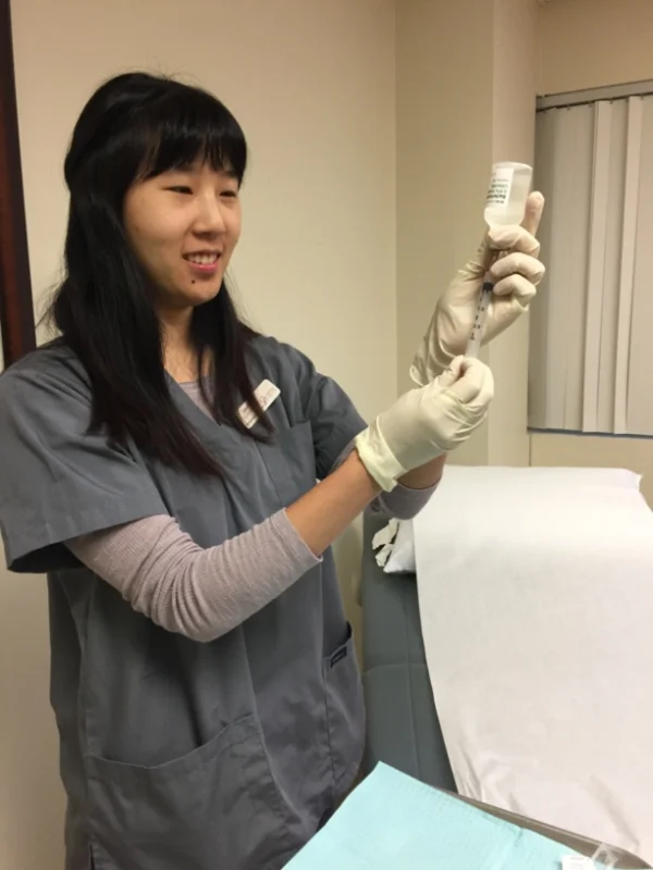 Gap Year Mentorship student practicing sterile technique